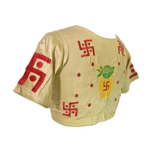 Side back view of traditional embroidered cotton blouse